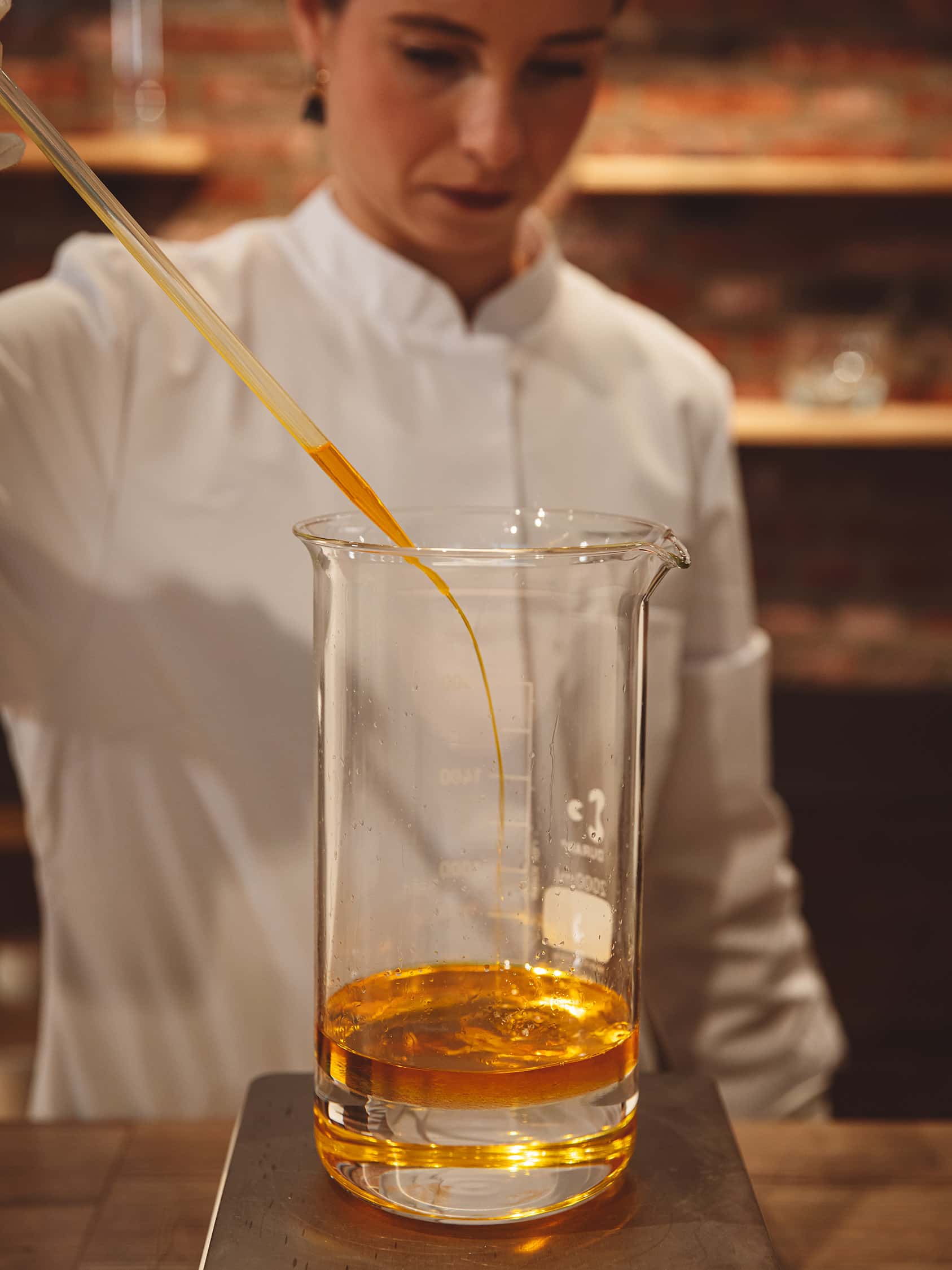 Perfumer blending a bespoke spatial fragrance